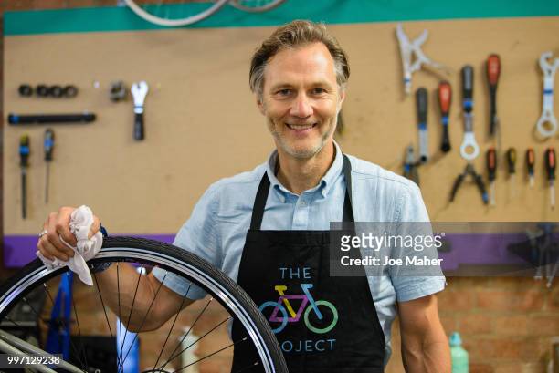 David Morrissey attends a photocall to announce the National Lottery funding of The Bike Project at The Bike Project on July 12, 2018 in London,...