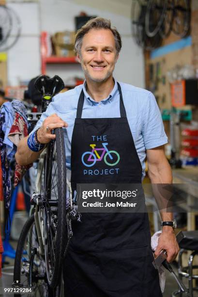 David Morrissey attends a photocall to announce the National Lottery funding of The Bike Project at The Bike Project on July 12, 2018 in London,...