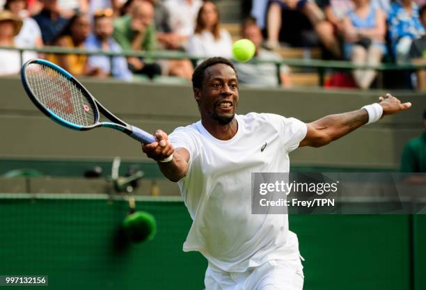 Gael Monfils of France in action against Kevin Anderson of South Africa in the fourth round of the gentlemen's singles at the All England Lawn Tennis...