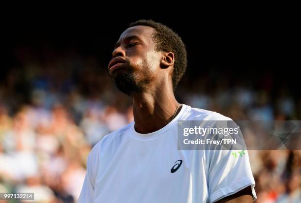 Gael Monfils of France looks frustrated against Kevin Anderson of South Africa in the fourth round of the gentlemen's singles at the All England Lawn...