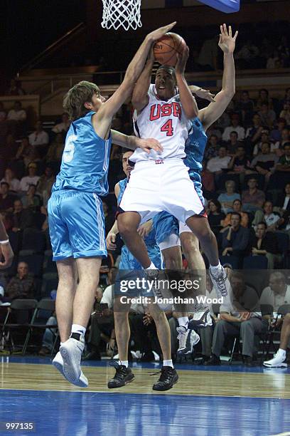 Andre Miller of the USA takes a rebound during the Mens Basketball match between the USA and Argentina, played at the South Bank Convention Centre,...