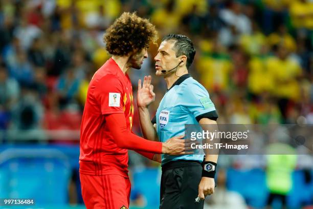 Marouane Fellaini of Belgium speaks with referee Milorad Mazic during the 2018 FIFA World Cup Russia Quarter Final match between Brazil and Belgium...