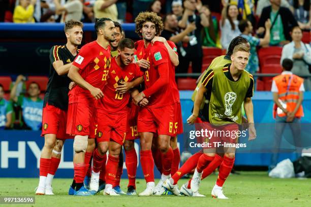 Players of Belgium celebrate after winning the 2018 FIFA World Cup Russia Quarter Final match between Brazil and Belgium at Kazan Arena on July 6,...