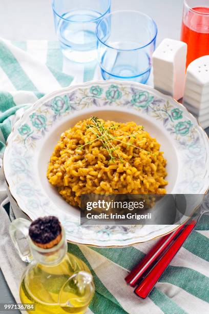 risotto alla milanese with saffron . healthy itali - itali stock pictures, royalty-free photos & images