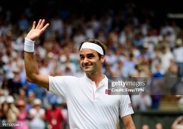 Roger Federer of Switzerland celebrates after beating Adrian Mannarino of France in the fourth round of the gentlemen's singles at the All England...