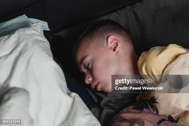 boy sleeping - malopolskie province stock pictures, royalty-free photos & images