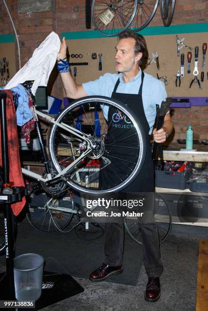 David Morrissey attends a photocall to announce the National Lottery funding of The Bike Project at The Bike Project on July 12, 2018 in London,...