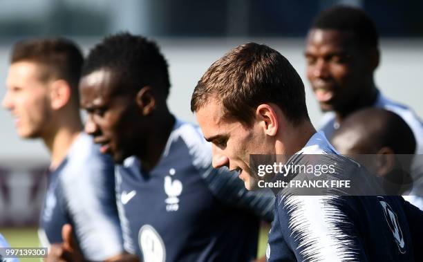 France's forward Antoine Griezmann attends in training session at the Glebovets stadium in Istra, some 70 km west of Moscow on July 12 ahead of their...