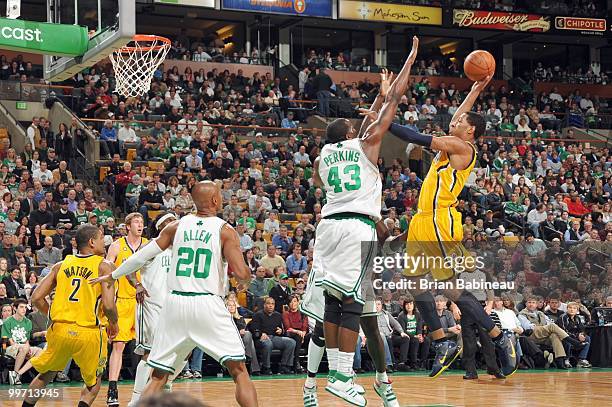 Danny Granger of the Indiana Pacers puts a shot up against Kendrick Perkins of the Boston Celtics on March 12, 2010 at the TD Garden in Boston,...