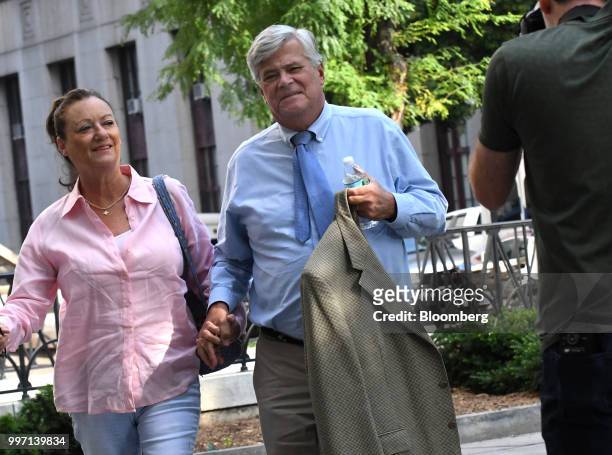 Former State Senate Majority Leader Dean Skelos, right, arrives at federal court in New York, U.S., on Thursday, July 12, 2018. Prosecutors say the...