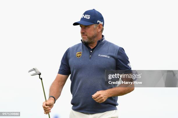 Lee Westwood of England reacts to a birdie putt on hole fourteen during day one of the Aberdeen Standard Investments Scottish Open at Gullane Golf...