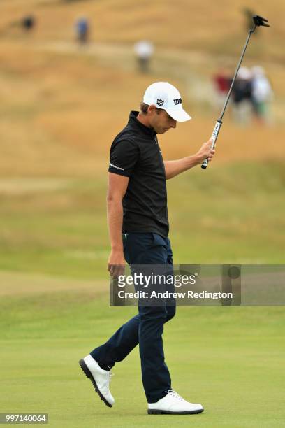Joakim Lagergren of Sweden reacts to an eagle putt on hole two during day one of the Aberdeen Standard Investments Scottish Open at Gullane Golf...