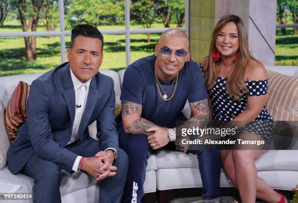 Jorge Bernal, Wisin and Adamari Lopez are seen on the set of "Un Nuevo Dia" at Telemundo Center to promote the show "La Voz" on July 12, 2018 in...