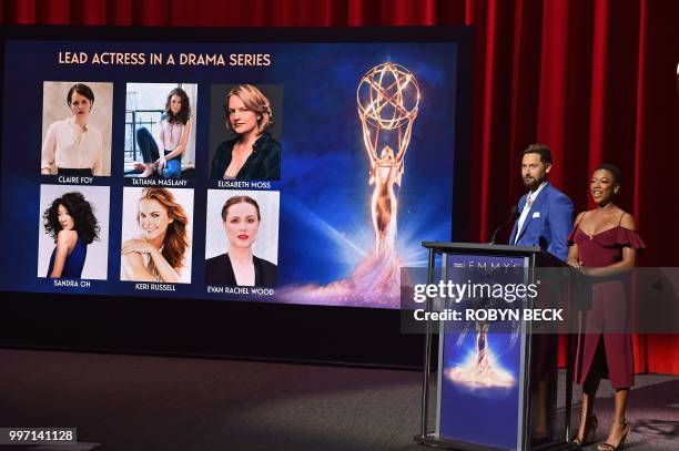 Actors Samira Wiley and Ryan Eggold speak on stage at the nominations announcement for the 70th Emmy Awards, July 12, 2018 at the Television...