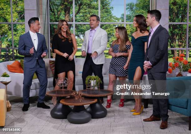 Jorge Bernal, Rashel Diaz, Hector Sandarti, Adamari Lopez, Zuleyka Rivera and Frederik Oldenburg are seen on the set of "Un Nuevo Dia" at Telemundo...