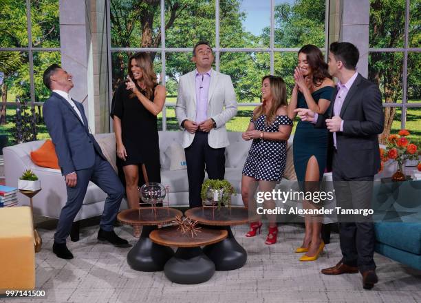 Jorge Bernal, Rashel Diaz, Hector Sandarti, Adamari Lopez, Zuleyka Rivera and Frederik Oldenburg are seen on the set of "Un Nuevo Dia" at Telemundo...