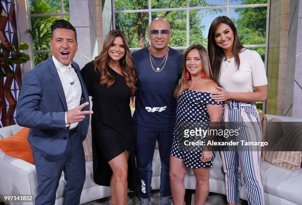 Jorge Bernal, Rashel Diaz, Wisin, Adamari Lopez and Erika Csizer are seen on the set of "Un Nuevo Dia" at Telemundo Center to promote the show "La...