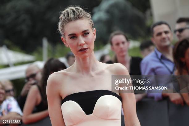 English actress Vanessa Kirby poses on the red carpet as he arrives to attend the world premiere of his new film Mission: Impossible Fallout, on July...