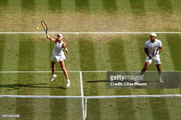 Jay Clarke and Harriet Dart of Great Britain return against Juan Sebastian Cabal of Colombia and Abigail Spears of the United States during their...