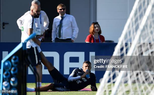 France's forward Kylian Mbappe attends a training session at the Glebovets stadium in Istra, some 70 km west of Moscow on July 12 ahead of their...