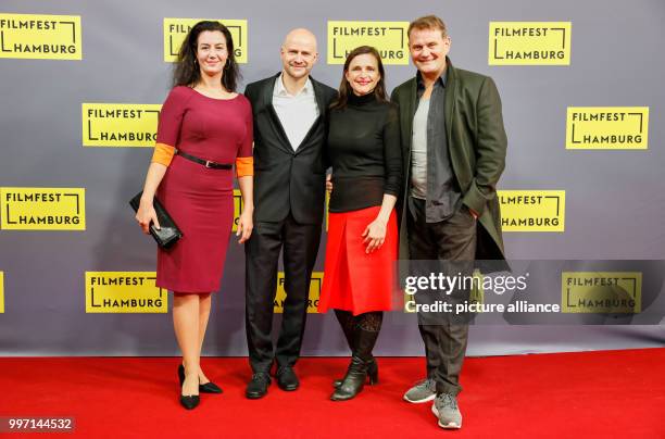 Director Barbara Albert and actors Katja Kolm , Miko Lukas and Devid Striesow arrive for the German premiere of "Licht" during the Filmfest Hamburg...