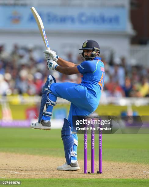 England bowler Liam Plunkett is pulled to the boundary by India batsman Rohit Sharma during the 1st Royal London One Day International match between...