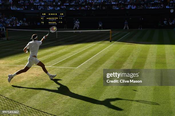 Juan Martin Del Potro of Argentina in action against Rafael Nadal of Spain during their Men's Singles Quarter-Finals match on day nine of the...