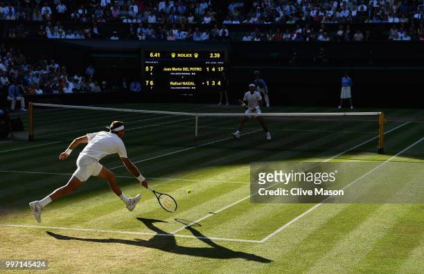 Juan Martin Del Potro of Argentina in action against Rafael Nadal of Spain during their Men's Singles Quarter-Finals match on day nine of the...