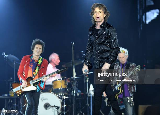 The Rolling Stones, composed of Ron Wood , Charlie Watts, Mick Jagger and Keith Richards performing onstage during a concert in the Esprit Arena in...