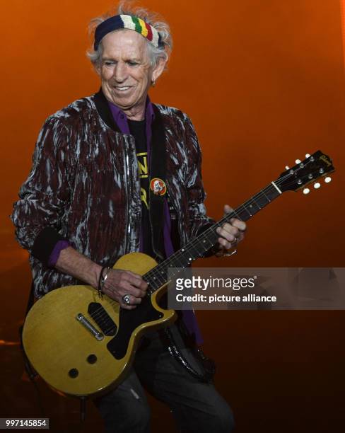 Keith Richards, guitar player for the band The Rolling Stones, performing onstage during a concert in the Esprit Arena in Dusseldorf, Germany, 09...
