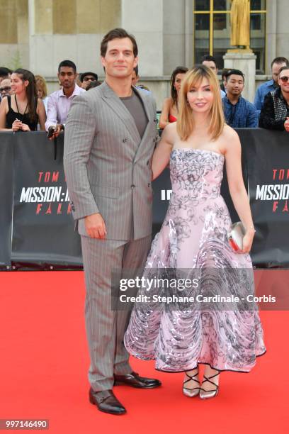 Actors Henry Cavill and Alix Benezech attend the Mission: Impossible - Fallout' Global Premiere in Paris on July 12, 2018 in Paris, France.