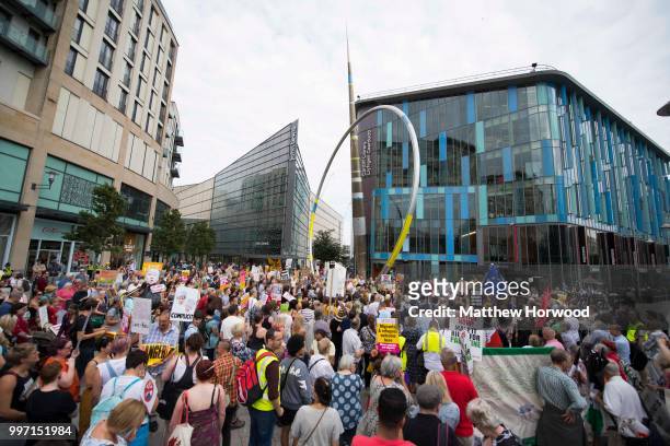 Protestors gather outside Cardiff Library on the Hayes in Cardiff to protest against a visit by the President of the United States Donald Trump on...