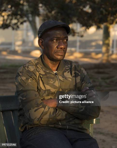 Uruanaani Scara Matundu, a representative of the Herero community, sitting in a park in Windhoek, Namibia, 12 May 2017. His family fled to Botswana...