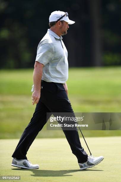 Steve Wheatcroft walks across the 17th green during the first round of the John Deere Classic at TPC Deere Run on July 12, 2018 in Silvis, Illinois.