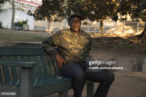 Uruanaani Scara Matundu, a representative of the Herero community, sitting in a park in Windhoek, Namibia, 12 May 2017. His family fled to Botswana...