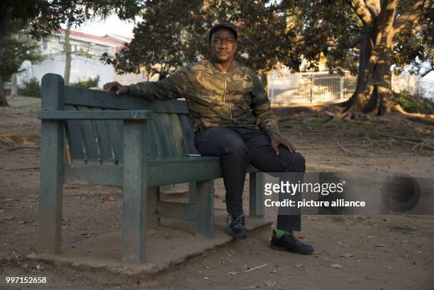 Uruanaani Scara Matundu, a representative of the Herero community, sitting in a park in Windhoek, Namibia, 12 May 2017. His family fled to Botswana...