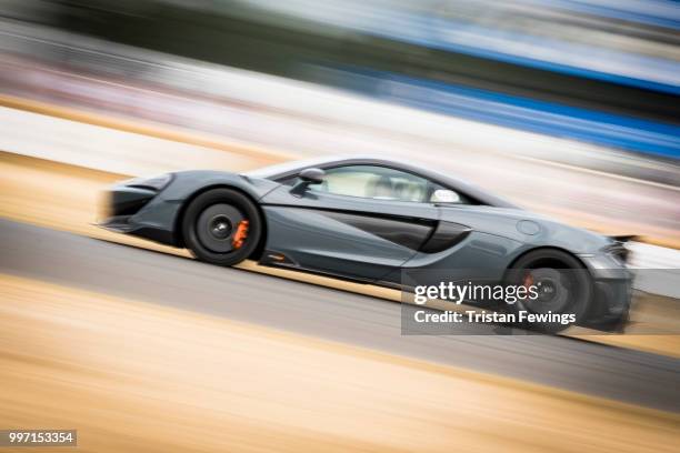 Race car does a lap of the race course during the Goodwood Festival Of Speed at Goodwood on July 12, 2018 in Chichester, England.