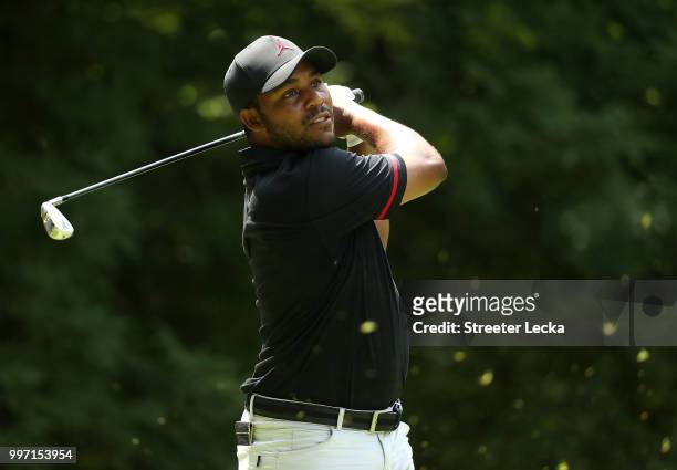 Harold Varner III hits a tee shot on the sixth hole during the first round of the John Deere Classic at TPC Deere Run on July 12, 2018 in Silvis,...