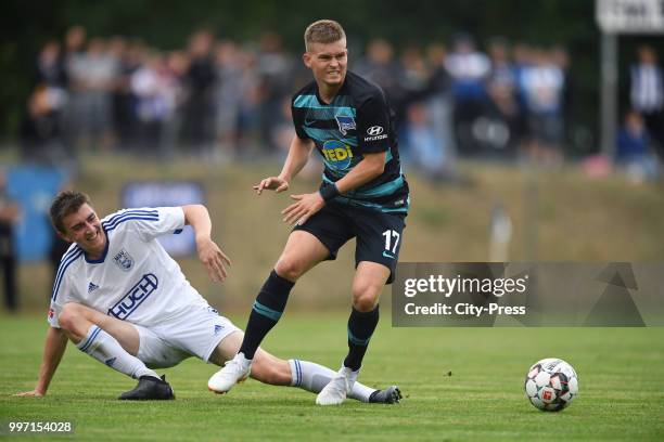 Lars Mueller of MSV Neuruppin and Maximilian Mittelstaedt of Hertha BSC during the game between MSV Neuruppin against Hertha BSC at the...