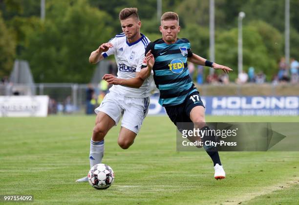 Tomasz Serwta of MSV Neuruppin and Maximilian Mittelstaedt of Hertha BSC during the game between MSV Neuruppin against Hertha BSC at the...