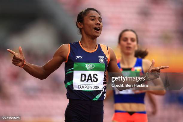 Hima Das of India celebrates winning gold in the final of the women's 400m on day three of The IAAF World U20 Championships on July 12, 2018 in...