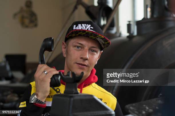 Dominique Aegerter of Swiss and Kiefer Racing speaks on phone during the pre-event "MotoGP riders visit the historic Oelsnitz / Erzgebirge coal mine...