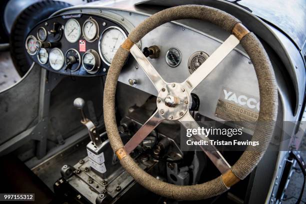 Stearing wheel and interior of a classic racing car at the Goodwood Festival Of Speed at Goodwood on July 12, 2018 in Chichester, England.