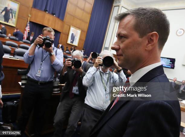 Deputy Assistant FBI Director Peter Strzok walks away during a break in a joint committee hearing of the House Judiciary and Oversight and Government...