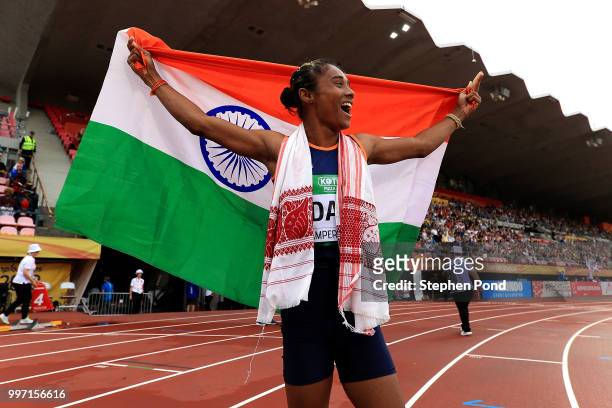 Hima Das of India celebrates winning gold in the final of the women's 400m on day three of The IAAF World U20 Championships on July 12, 2018 in...