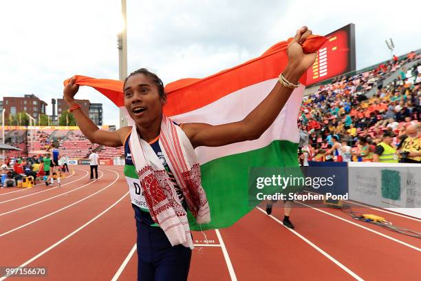 Hima Das of India celebrates winning gold in the final of the women's 400m on day three of The IAAF World U20 Championships on July 12, 2018 in...