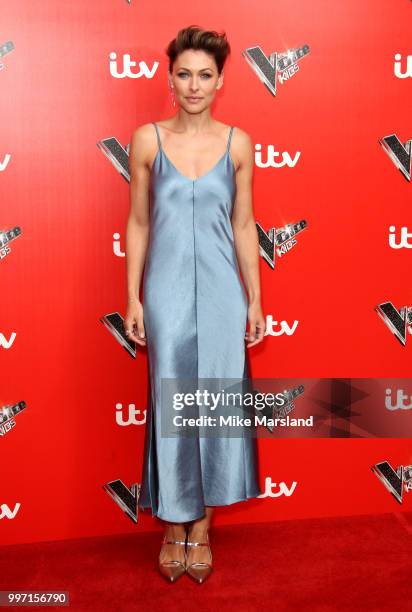 Emma Willis attends a photocall to launch season 2 of "The Voice: Kids" at Madame Tussauds on July 12, 2018 in London, England.