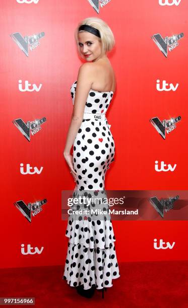 Pixie Lott attends a photocall to launch season 2 of "The Voice: Kids" at Madame Tussauds on July 12, 2018 in London, England.