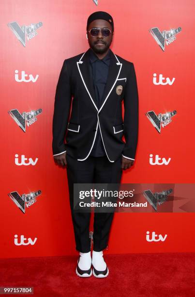 Will.i.am attends a photocall to launch season 2 of "The Voice: Kids" at Madame Tussauds on July 12, 2018 in London, England.