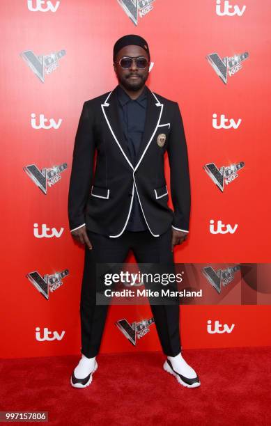 Will.i.am attends a photocall to launch season 2 of "The Voice: Kids" at Madame Tussauds on July 12, 2018 in London, England.